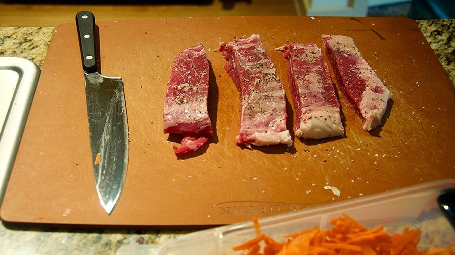 Cutting up meat and vegetables