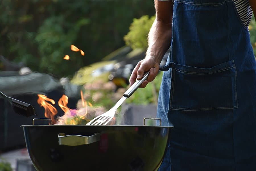 A flaming kettle bbq