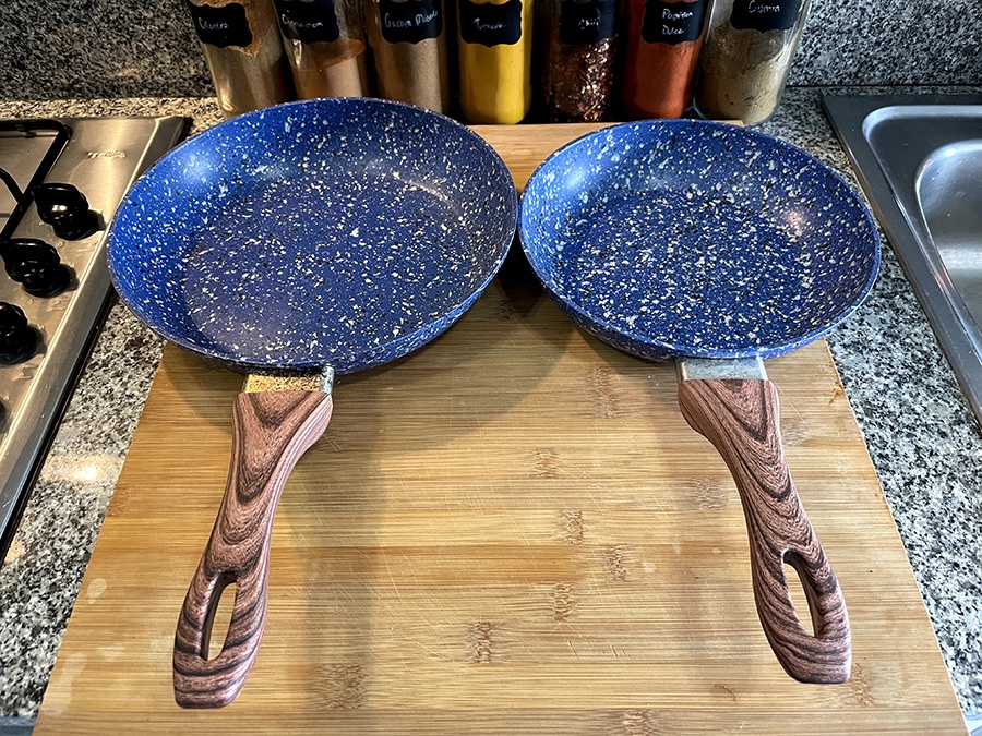 two non-stick blue saute pans