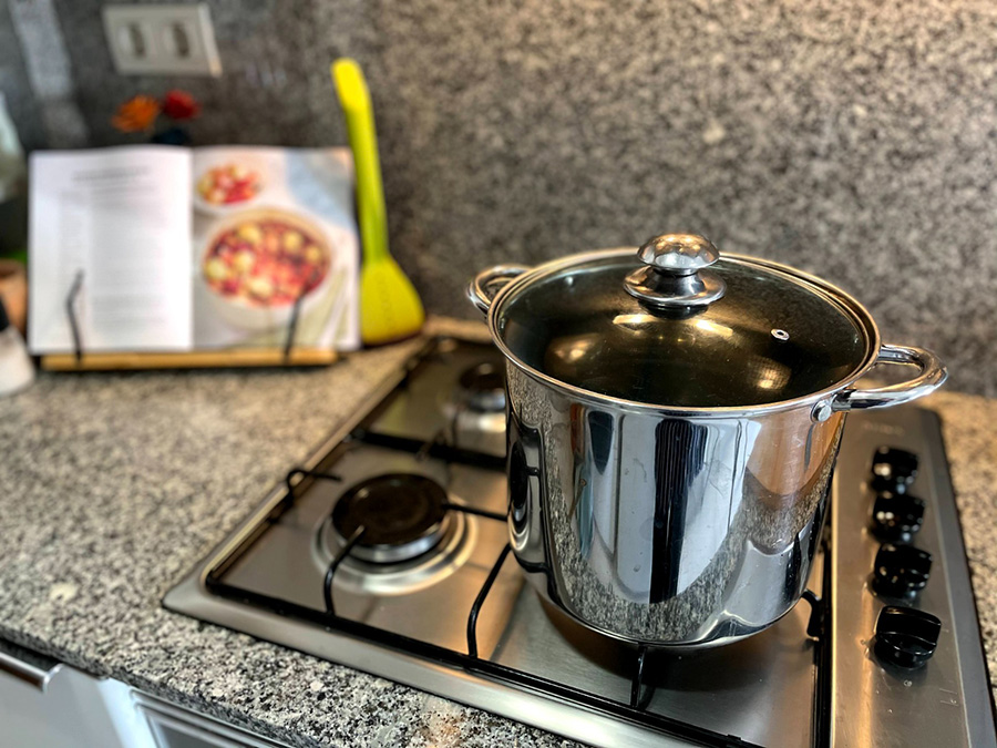 A stainless steel stockpot with lid
